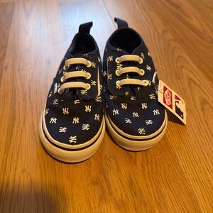 Vans Kids Navy Canvas Sneakers with White Logo Print. Unisex
